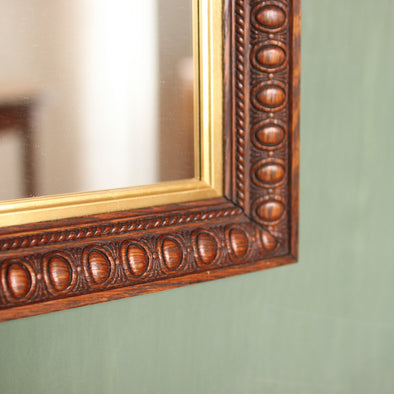 Edwardian Oak Mirror with Thumbnail Carving